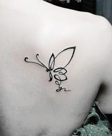 a woman with a butterfly tattoo on her back