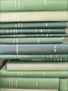 a stack of books sitting on top of each other