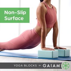 a woman is doing yoga with the words non - slip surface above her head and bottom