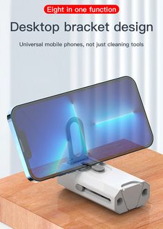 an image of a cell phone charging on a wooden table with the text, eight in one function desktop bracket design universal mobile phones, not just cleaning tools