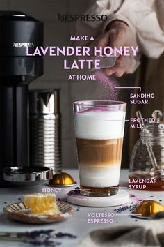 the ingredients to make a lavender honey latte are shown in front of an espresso machine