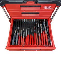 a red toolbox filled with lots of tools