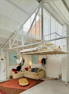 a person hanging upside down in a living room