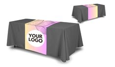 two tables covered with grey tablecloths and a sign that says your logo on it