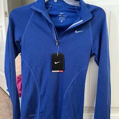 Brand New With Tags Xs Nike Dri-Fit Long Sleeve Top. Never Worn. Has An Imperfection On The Back (See Pictures). It Has Built In Thumbholes In The Sleeves To Cover Your Hands When It’s Cold. Shirt With Hoodie, White Nike Hoodie, Nike Long Sleeve Shirt, Nike Running Shirt, Nike Light, Personal Things, Nike Neon, Nike Long Sleeve, Nike Tank Tops