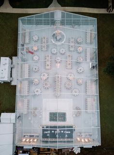 an aerial view of a building with many lights