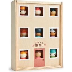 a wooden box with eight small cups in it and the words party for hotel printed on the front