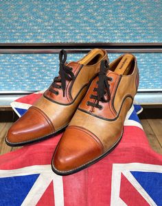 Absolutely stunning pair of 70s Dolcis brown/tan leather shoes in fabulous condition,just the lightest signs of wear,the different shades of brown over the light tan I am not sure if it's the shoes rubbing together or it's meant to be that way,either way they look amazing,lovely condition to the uppers and just light wear to the soles,the impressive heel is 5cm high. Circa 1976 maybe up-to 1978 Saturday night fever era,kind of a 70s version of the Co-respondent Spectator shoe. UK Size 9 Euro 43 Brown Oxfords With Leather Lining, Brown Closed Toe Oxfords With Leather Lining, Brown Oxfords With Almond Toe And Rubber Heel Cap, Brown Almond Toe Oxfords With Rubber Heel Cap, Brown Almond Toe Heels With Leather Lining, Retro Oxfords With Brogue Detailing And Almond Toe, Retro Leather Shoes With Rubber Sole, Retro Cap Toe Oxfords With Leather Sole, Retro Round Toe Dress Shoes For Business