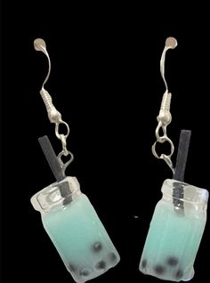 the earrings are made out of glass and have silver hooks on each earwires