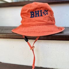 Sun protection meets fun and style with our BHI Embroidered Monogram UPF Boonie Youth Bucket Hat. This cool hat for kids features soft yet durable garment-washed-twill fabric for easy-wearing comfort and durability. A mesh lining promotes faster drying and cooling breathability. The boonie style gives all-around coverage with UPF 50 sun protection to shield against harsh rays. A breakaway chin cord feels comfy while keeping the hat in place. Cotton Durable & ideal for wear in the great outdoors Adjustable Cotton Sun Cap, Wide Brim Hat With Embroidered Logo For Outdoor, Adjustable Fit Cotton Brimmed Bucket Hat, Adjustable Cotton Bucket Hat With Curved Brim, Casual Cotton Bucket Hat With Adjustable Fit, Adjustable Wide Brim Bucket Hat With Embroidered Logo, Adjustable Wide Brim Cotton Hat, Casual Wide Brim Hat With Embroidered Logo, Adjustable Bucket Hat With Embroidered Logo And Flat Brim