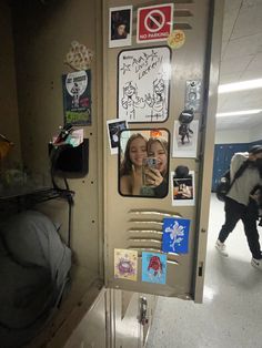 a door with pictures and stickers on it