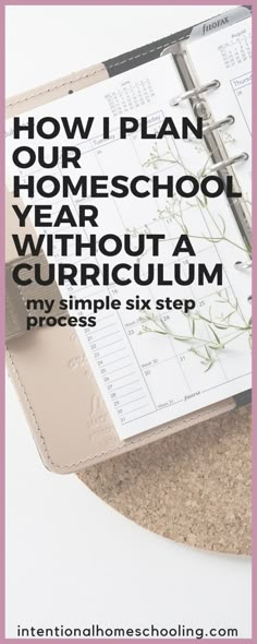 a notebook with the title how i plan our homeschool year without a curriculum