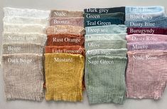 six pairs of knee high socks with different colors and names on the bottom, all lined up in rows