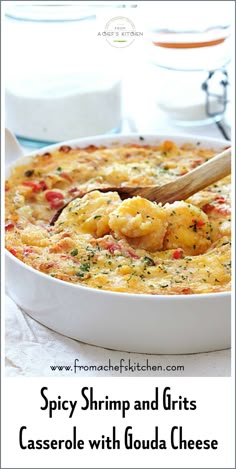 a close up of a casserole in a pan with a wooden spoon