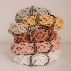 several crocheted dog collars stacked on top of each other with the word dog collar written across them