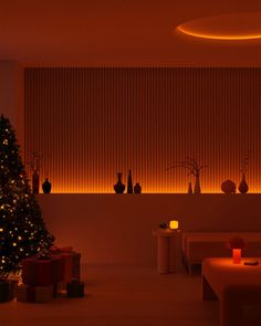 a living room with a lit christmas tree in the corner