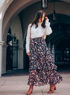 Turtleneck Maxi Skirt, Floral Maxi Skirt Outfit Winter, Long Skirt For Winter Outfits, Layered Midi Skirt, Crop Sweater Over Dress, Floral Dress Outfit Winter, How To Wear Skirts In Winter, Sweater Over Maxi Dress, Long Skirts Winter