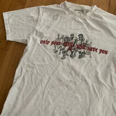 This Nike t-shirt from the late 1990s has a double sided graphic that on the front says "Only Your Skills Will Save You" above a swoosh and on the back it reads "Battlegrounds: Where Ballers Are Made". This piece is a grey tag, made in Canada. It is labelled a small but is more like an XL. There are a couple of spots of small stains (pictured) so please assess the photos carefully using your own personal judgement.  Size: XS (Labelled Small) Pit to Pit: 18" Length: 25" Please see our FAQ's for m Basketball Tees, Late 90s, Nike Tshirt, Save Yourself, Basketball, Favorite Outfit, Gender Neutral, Nike, Adult Outfits