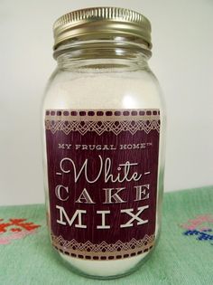 a glass jar filled with white cake mix