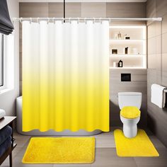 a bathroom with yellow rugs on the floor and a shower curtain in the corner