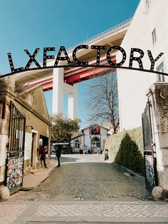 an arch with the words lxfactory over it