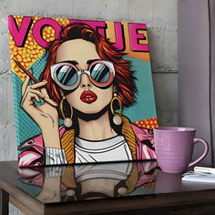 a painting of a woman with sunglasses on top of a table next to a pink coffee cup