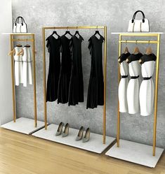 three racks with dresses and shoes on them