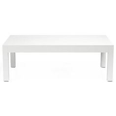 a white coffee table sitting on top of a white floor