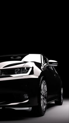 a black and white photo of a sports car