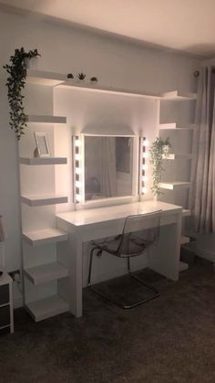 a white desk with lights on it next to a mirror and chair in a room