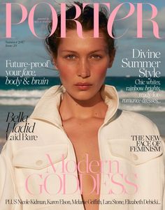 the cover of porter magazine with a woman in white shirt and jeans on the beach