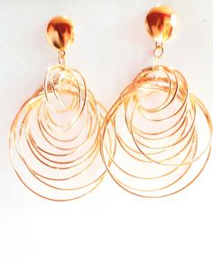 Beautiful stunning lunar rock gold and rhodium plated handcrafted simple swirl earrings. These versatile earrings are perfect compliment to any outfit. Pick your own colour. Handcrafted finished with a high polish, butterfly clasps.  Hypoallergenic posts. Quantity: 1 pair. Modern Twist Metal Hoop Earrings As Gift, Layered Earrings, Swirl Earrings, Earrings In Gold, 14kt Gold, Last Minute Gifts, Multi Layering, Long Necklace, Rhodium Plated