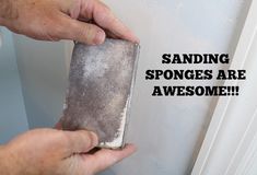 a man is sanding sponges on the wall with an ad that reads, sanding sponges are awesome