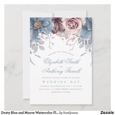 an elegant floral wedding card with blue and pink flowers on the front, white background