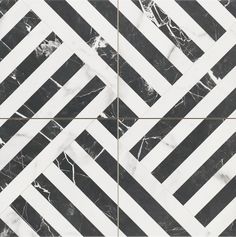 black and white marble tiles with diagonal lines in the middle, on top of each other