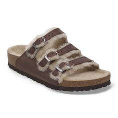 The Florida Fresh - strappy style meets signature comfort. This BIRKENSTOCK slide features three slender adjustable straps and a contoured cork/latex footbed that forms to the shape of your foot. This version is lined with especially cozy shearling. With D-buckles and a color-coordinated footbed to round off the overall look. The upper is made from extra thick oiled nubuck leather. Anatomically shaped cork-latex footbed Upper: oiled nubuck leather Footbed lining: shearling Sole: EVA Details: three straps each with an individually adjustable metal pin buckle; color-coordinated footbed “Made in Germany” Round Off, Birkenstock Florida, Nubuck Leather, Good Grips, Natural Leather, Strap Sandals, Birkenstock, All Fashion, Adjustable Straps