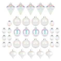 a collection of white christmas ornaments with iridescents on the top and bottom