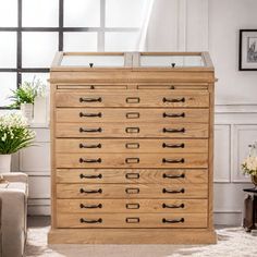 a large wooden dresser sitting in a living room