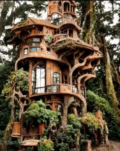 an unusual tree house built into the side of a hill in europe, with plants growing on it