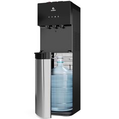 the water dispenser has two large bottles in it and is attached to a metal container