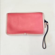 Authentic Designer, Two-Toned Pink Coach Wristlet Wallet. Brand New, Never Used. Measurements: 8”(L) X 5” (H) X 2.5 (W) Coach Clutch With Zipper Closure, Pink Clutch Wristlet, Coach Rectangular Clutch With Zipper Closure, Coach Clutch Pouch With Zipper Closure, Coach Clutch With Zipper For Daily Use, Pink Clutch Wallet With Wrist Strap, Travel Clutch Wallet With Wrist Strap, Travel Clutch Wristlet With Mobile Phone Bag, Travel Wallet Clutch With Wrist Strap