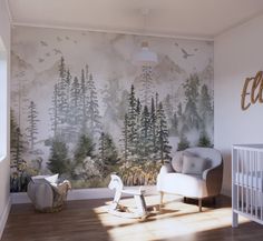 a baby's room with a wall mural and rocking chair in the foreground