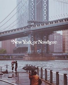 two people standing on a dock with an umbrella in front of a bridge and the words new york or nowhere