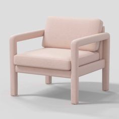 a pink chair sitting on top of a white floor