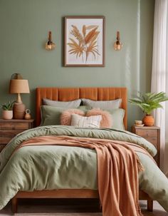 a bedroom with green walls and a bed covered in orange sheets, pillows and blankets