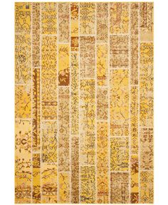 a yellow and brown rug with many different designs on it's sides, including an area