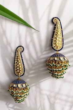 Blue Kundan and Pearl Handpainted Meenakari Jhumka Earrings | Etsy Luxury Bollywood Earrings With Zari Work, Luxury Kundan Tikka With Meenakari Details, Luxury Meenakari Temple Jewelry Chandelier Earrings, Luxury Hand-set Green Jhumkas, Luxury Jhumkas With Intricate Design, Luxury Gold Jhumkas For Navratri, Luxury Festive Earrings With Zari Work, Luxury Bridal Meenakari Earrings For Festivals, Luxury Intricate Design Jhumkas