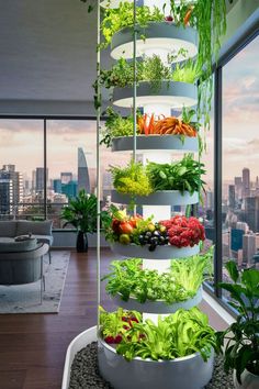 a vertical garden in the middle of a room with large windows and cityscape