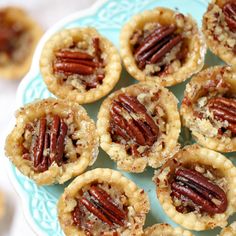 mini pecan pies on a blue plate with text overlay that says mini pecan pies