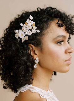 Beautifully handmade in our studio, this lovely bridal comb features hand sculpted blossoms and buds. Tiny Austrian crystal details sprinkled throughout and lovely brass leaves complete the look. -Adorned portions measures approximately 2.5" Wide; 3.5" Long -Austrian crystals -Handmade in our studio -Available in ivory/gold as pictured -Finished on a gold plated wire comb -Style 2130 earrings sold separately Natural Hair Wedding, Natural Wedding Hairstyles, Shaped Crystals, Curly Wedding Hair, Flower Comb, Hair Adornments, Bridal Comb, Wedding Hair Inspiration